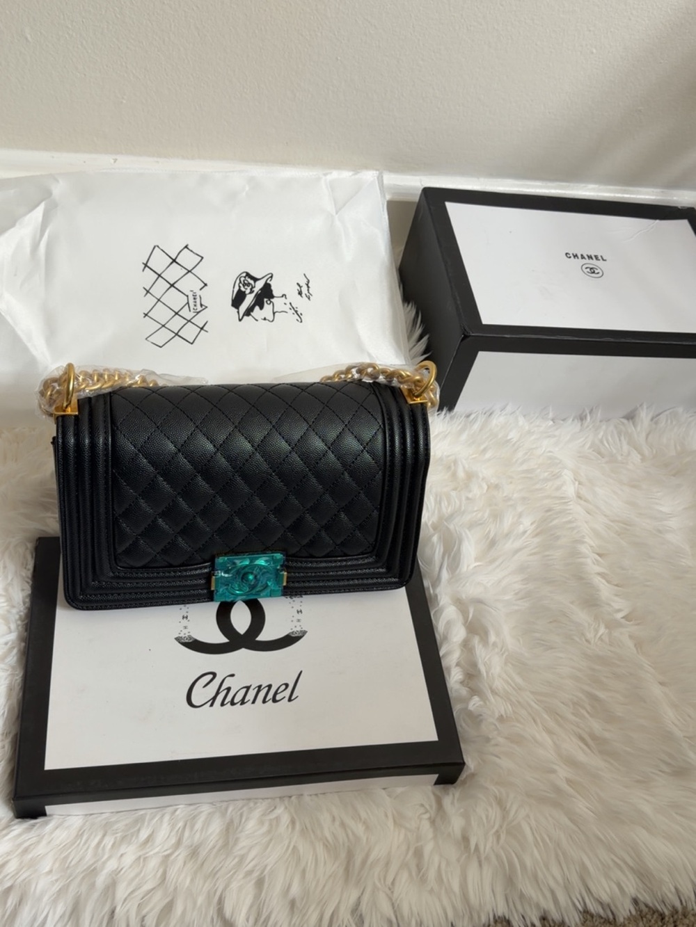 Chanel Quilted Leather Shoulder Bag in Black with Gold Chain